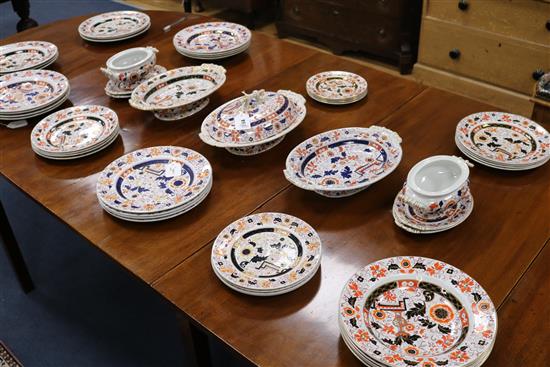 An Imari pattern Ironstone part dinner service, (approx 55 pieces, worn)